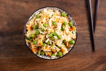 Oriental cantonese rice. Basmati rice with green peas, eggs and carrots.