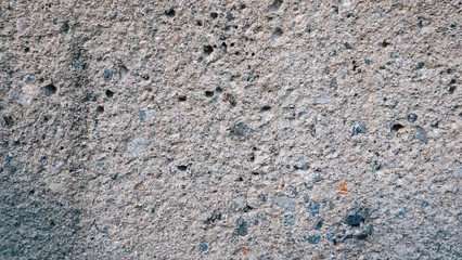 Macro Close up of cement concrete wall texture abstract background with cracked small hole. style material for interior or exterior of building...
