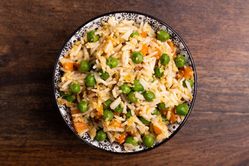 Oriental cantonese rice. Basmati rice with green peas, eggs and carrots.