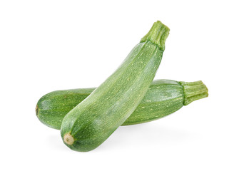 fresh green zucchini with slice isolated on white background