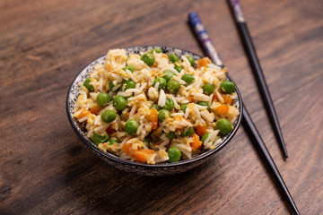 Oriental cantonese rice. Basmati rice with green peas, eggs and carrots.
