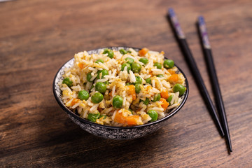 Oriental cantonese rice. Basmati rice with green peas, eggs and carrots.