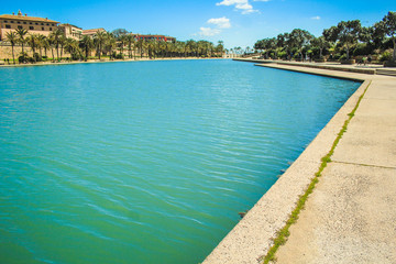 Fototapeta na wymiar Parc de la mar with its blue pool located in the capital Palma de Mallorca, Spain