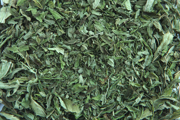 peppermint tea leafs - dried peppermint on white