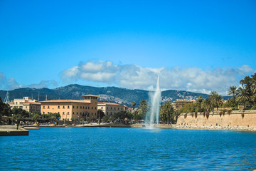 Parc de la mar with its blue pool and fountain located in the capital Palma de Mallorca, Spain © Joppi
