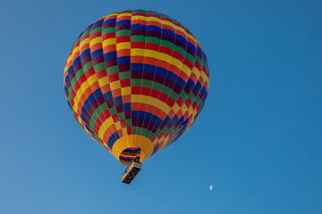 Hot Air balloons flying over amazing rock forms in Cappadocia