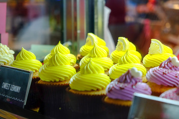 Colorful cupcake in the showcase