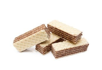 Crispy wafers with creamy hazelnut filling isolated on white background