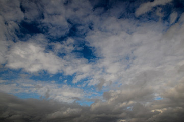 Fototapeta na wymiar blue dark sky with thick clouds