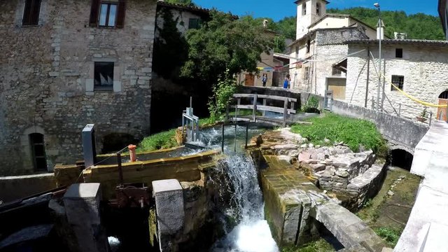 Italy, Umbria, Perugia, Rasiglia, time lapse of medieval village with torrents of water, waterfalls and streams that flow inside the village,