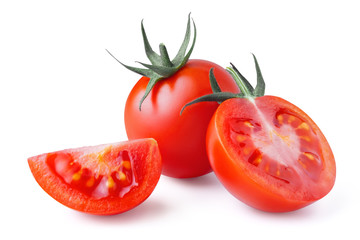 Whole and cut fresh, red tomatoes isolated on white background. Clipping path. Full depth of field.