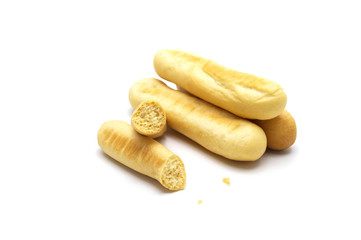 Rustic grissini bread sticks and broken with crumbs. Crispy straw biscuit isolated on white background.