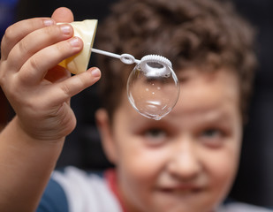 Soap bubble in the hand.