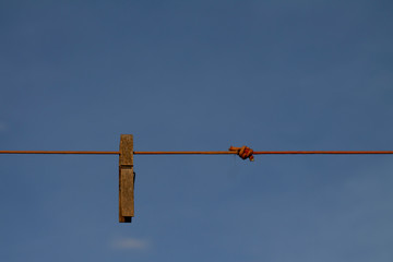 a single clothespin in the sky