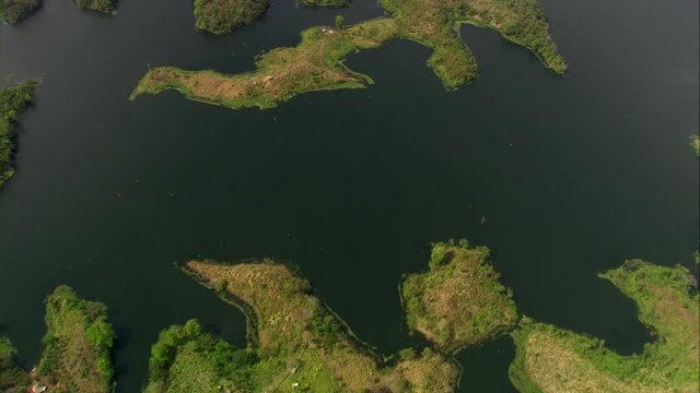Aerial view of Lake Bayano, small islands with palms and cloud forest in Panama Central America, filmed with Cineflex stabilization 5-Axis camera system