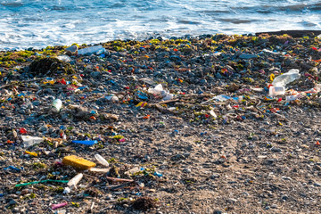 Plastic pollution, rubbish garbage on the beach
