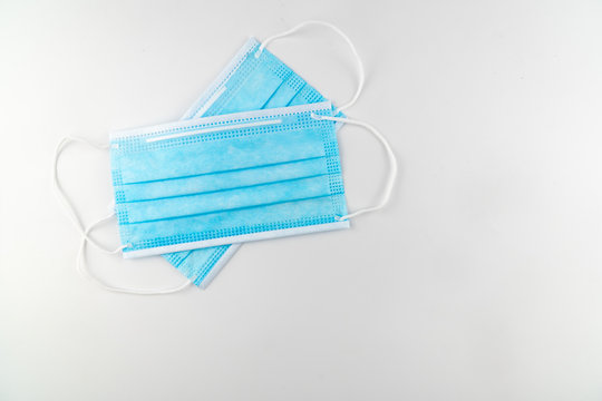 3 ply surgical face mask isolated on white background.