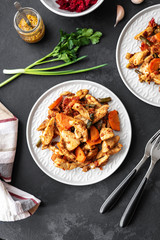 Fresh vegetable salad plate of tomatoes, pepper, carrot, french bean and chicken breast. Fried chicken meat, fillet with salad. Healthy food. Diet dinner or lunch menu. Salad plate on table. View from