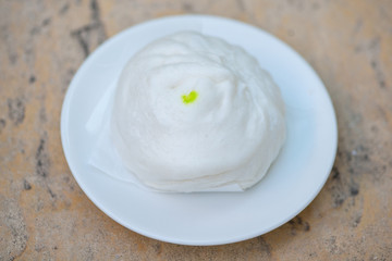 White steamed bun on white dish
