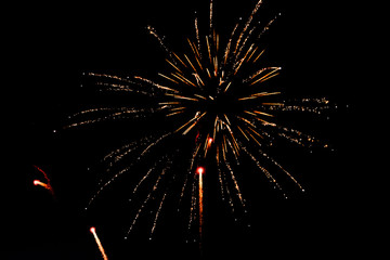 Salutes against the black sky, bright flashes, comets and shooting stars in the dark. © SValeriia