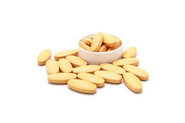 Group of  Vitamin C pills on white background. For protection Coronavirus (Covid-19) disease.