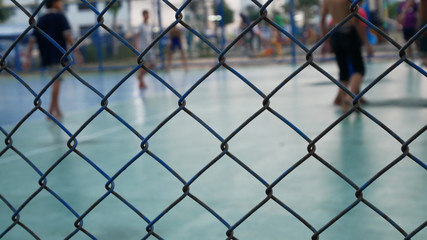 chain link fence with barbed wire