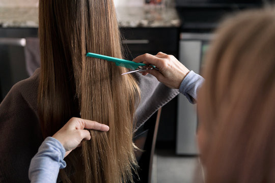 Anonymous Girl Has Long Hair Trimmed At Home