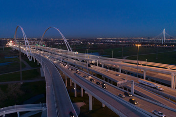 Modern highway bridge at twilight with light traffic