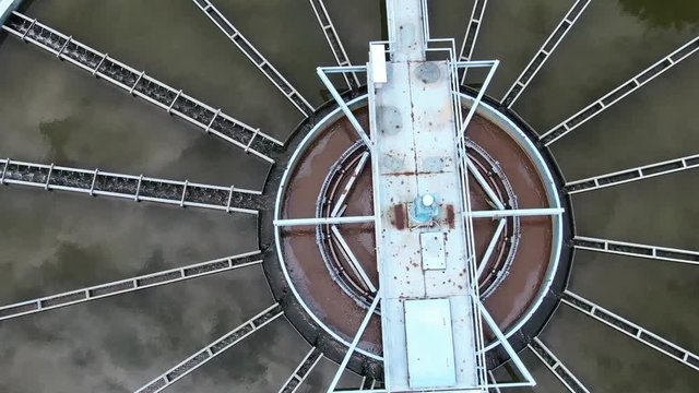 Aerial top view close up recirculation solid contact clarifier sedimentation tank, Water treatment plant