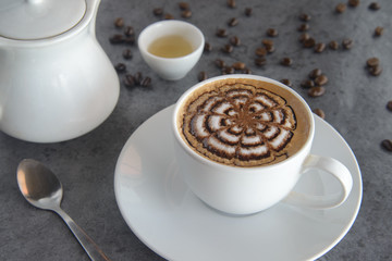 macchiato coffee with flower art on top coffee