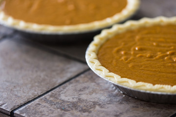 Homemade pumpkin pies ready to bake
