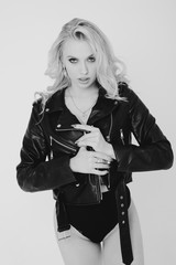 In body. Monochrome portrait of a blond beautiful young woman. Fashion model with a lovely shapely...