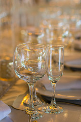 glasses of water, wine and champagne arranged on a wedding 