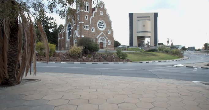 Woman is taking a picture of the Christ Church in Windhoek, Namibia, 4k
