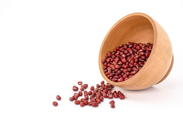 Red small Azuki beans ( Adzuki or japanese red bean ) in wooden bowl  isolated on white background.