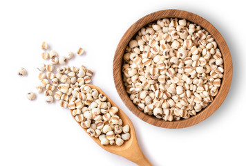 Job's tears in wooden bowl isolated on white background .