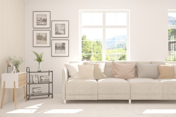 White living room with sofa and summer landscape in window. Scandinavian interior design. 3D illustration