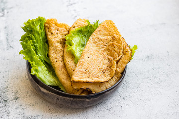 Crepes or flatbread tortillas with salad leaves . Vegan healthy food