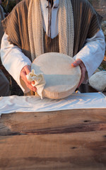 Cheese at market stall in a rural area.