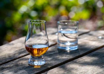 Tasting of scotch single malt whisky from Islay island, most intensely flavoured of all whiskies in Scotland