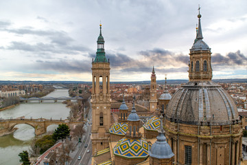 Aerial view of Zaragoza cityscape, with the Puente de Piedra bridge, the Ebro river from the tower of Cathedral-Basilica of Our Lady of the Pillar, Zaragoza, province Aragon, Spain