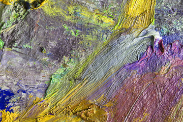 Background image of bright oil-paint palette closeup