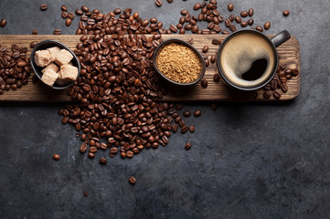 Coffee cup, sugar and roasted beans