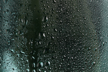 Water drops on metal surface. Abstract background