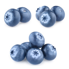 Collection of heaps of delicious blueberries, isolated on white background