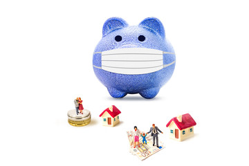 miniature family people with blue piggy bank isolate on white background.