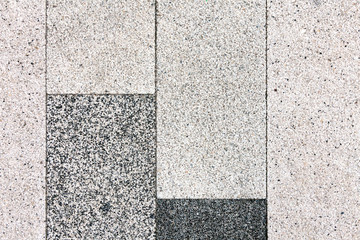 The texture of the sidewalk stone pavers for concrete from stone chips.