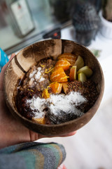 Bowls of oatmeal with berries and fruits