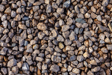 Background texture of small stones scattered on the ground