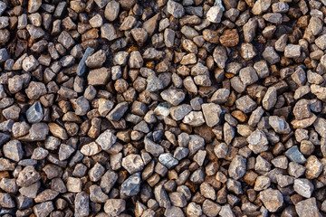 Fine crushed stone in warm light